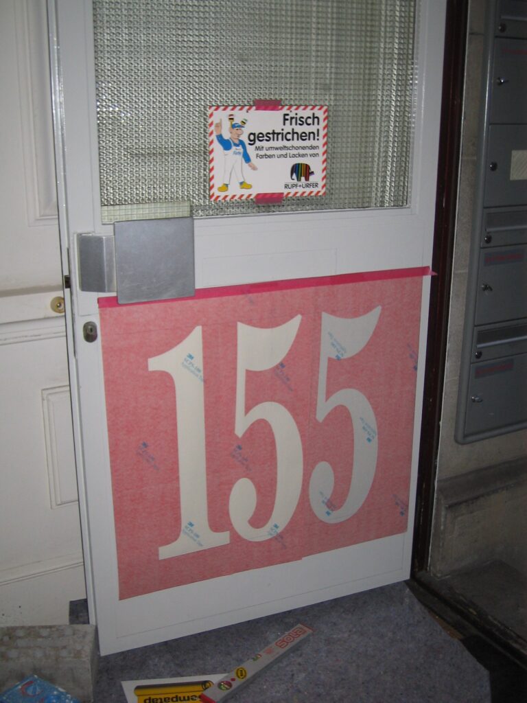 Schriftenmaler Schablone vor dem malen