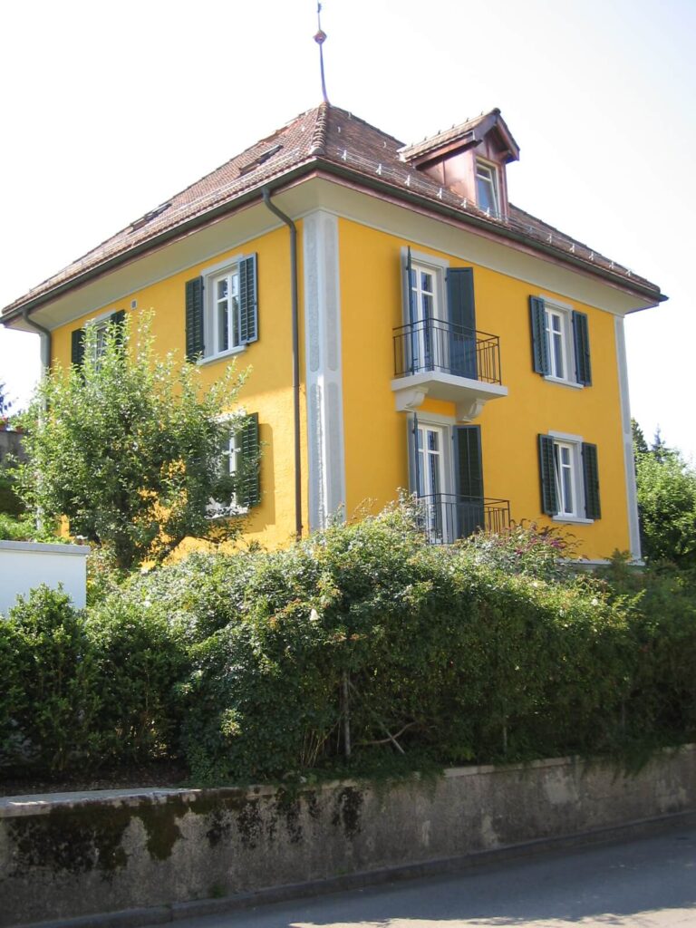 Fassadenrenovation gelbes Haus